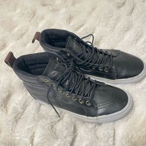 Black leather high top vans